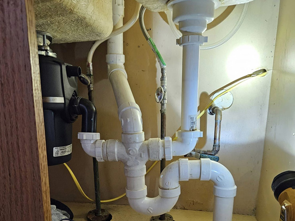 broken sink garbage disposal repair and drain clearing job